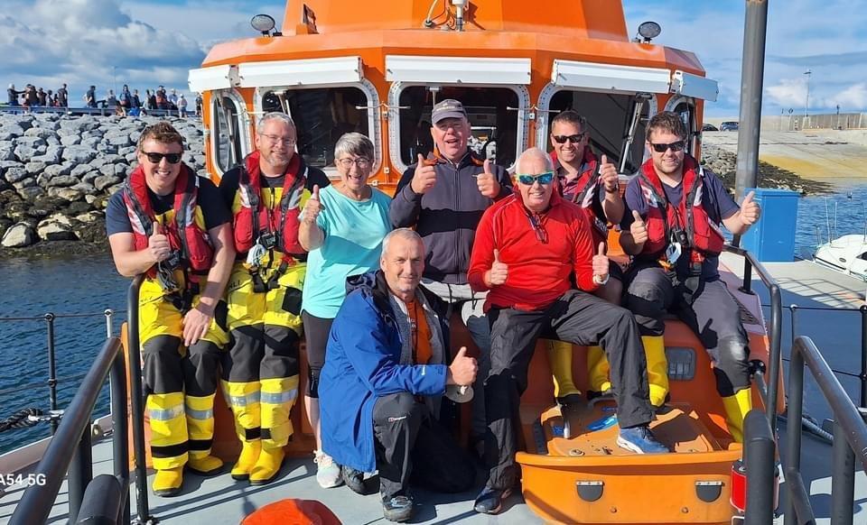 Aran Islands RNLI crew members Thomas Davis, Daniel O’Connell, Tommy Dirrane and Máirtín de Bhailis pictured with Fergal Somerville and his wife Mags (centre) and his support team Mark Rush and Gordon Adair (front).