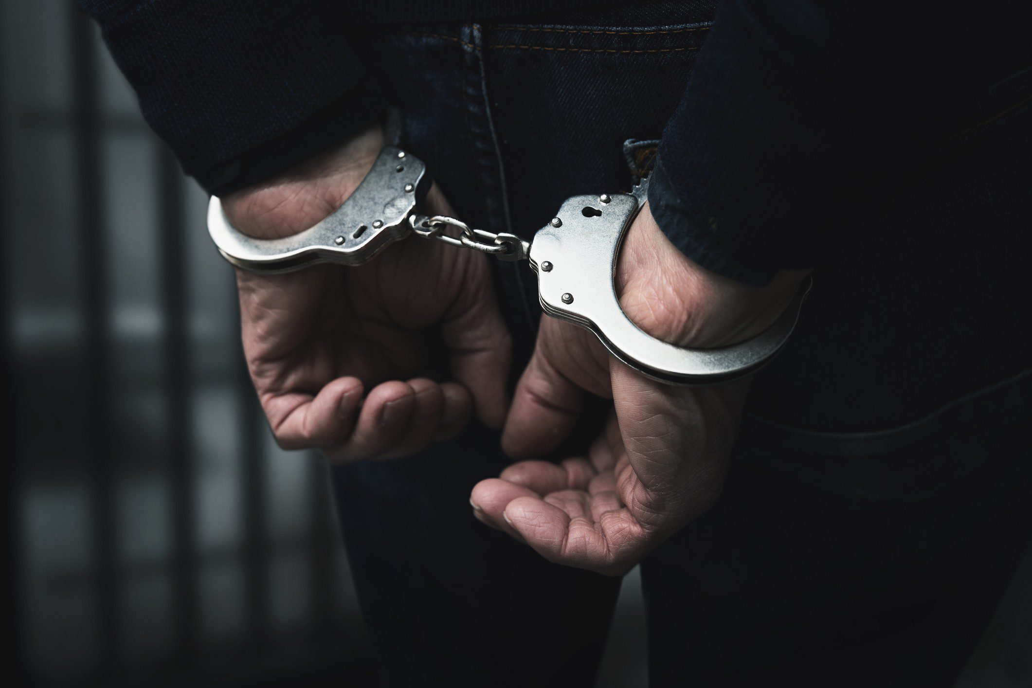 1. Main pic – Prisoner handcuffed